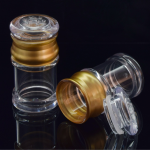Small Gold‑Plated Crystal Powder Bottle
